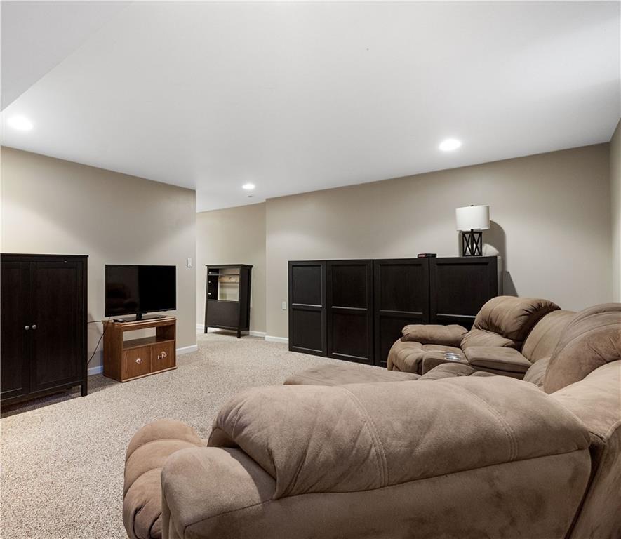 136 Maclaine Drive Carnegie, PA 15106 - Photo 28 of 30 a living room with furniture and a flat screen tv