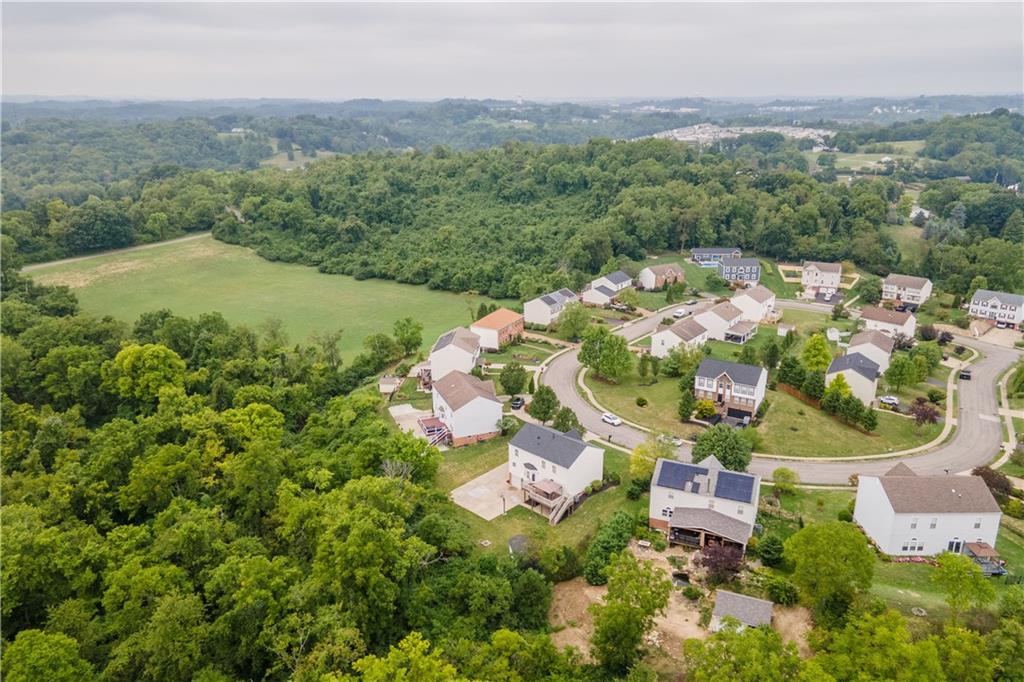 136 Maclaine Drive Carnegie, PA 15106 - Photo 8 of 30 an aerial view of a house with a garden and mountains