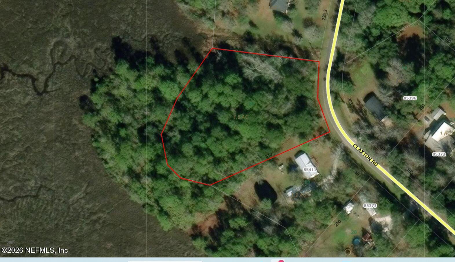1293 Claxton Road Yulee, FL 32097 - Photo 8 of 19 an aerial view of a house with a yard
