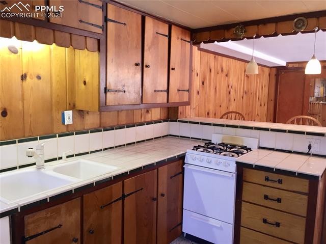 5755 Timpa Road Cascade, CO 80809 - Photo 46 of 49 Lower kitchen