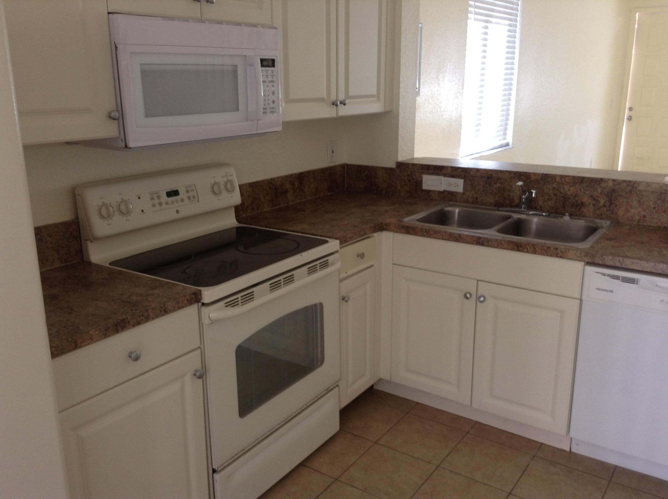 1936 Hibiscus Lane Riviera Beach, FL 33404 - Photo 3 of 5 best kitchen either