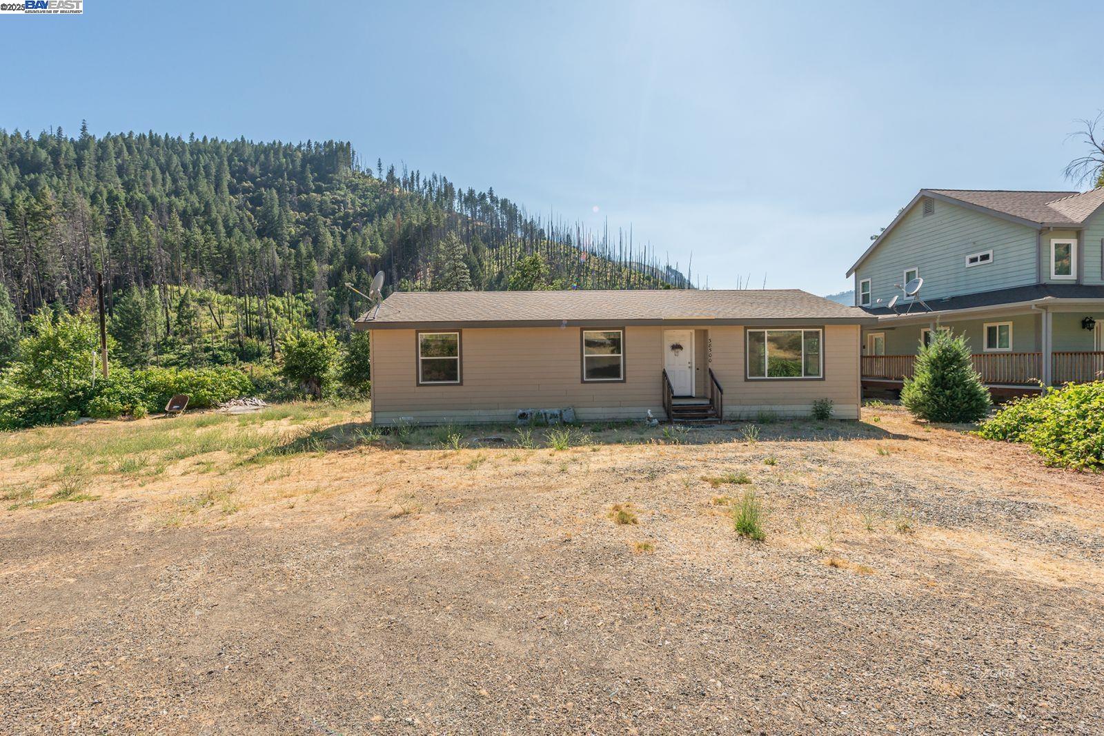 38500 Highway 299 Junction City, CA 96048 - Photo 45 of 49 front view of a house with a yard
