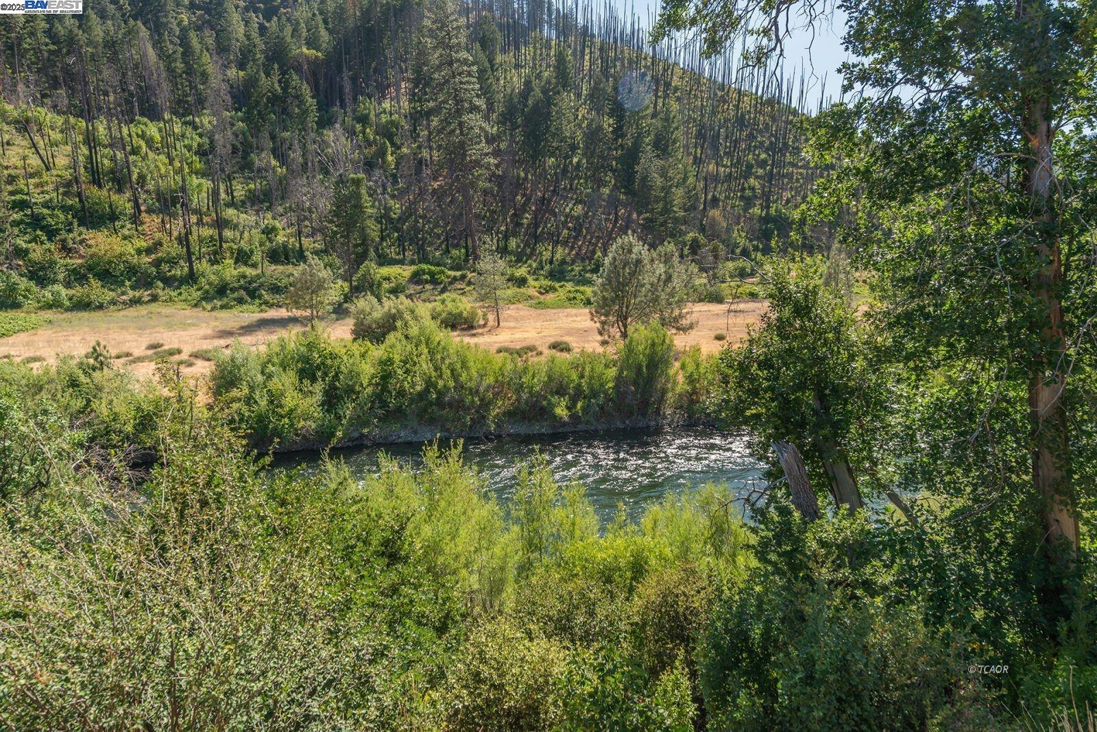 38500 Highway 299 Junction City, CA 96048 - Photo 49 of 49 a view of a lake view with houses in back