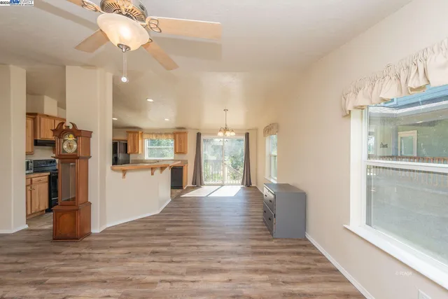 a view of a kitchen and a window