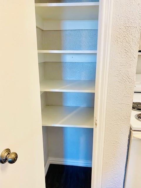 7621 McCallum Boulevard, Unit 108 Dallas, TX 75252 - Photo 20 of 26 a room with a closet