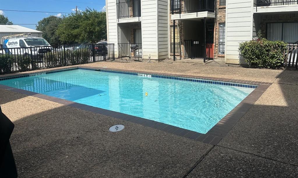 7621 McCallum Boulevard, Unit 108 Dallas, TX 75252 - Photo 21 of 26 a view of a backyard with sitting area