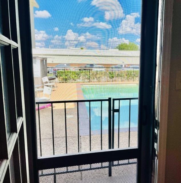 7621 McCallum Boulevard, Unit 108 Dallas, TX 75252 - Photo 23 of 26 a view of a glass door