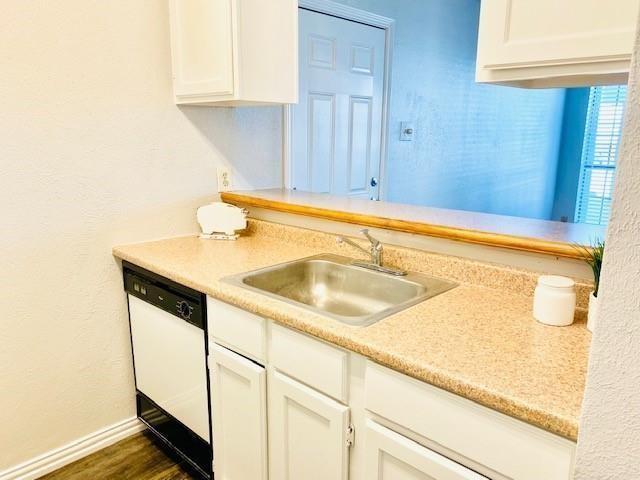 7621 McCallum Boulevard, Unit 108 Dallas, TX 75252 - Photo 3 of 26 a sink sitting next to a window