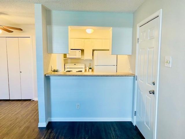 7621 McCallum Boulevard, Unit 108 Dallas, TX 75252 - Photo 8 of 26 a view of front door with wooden floor