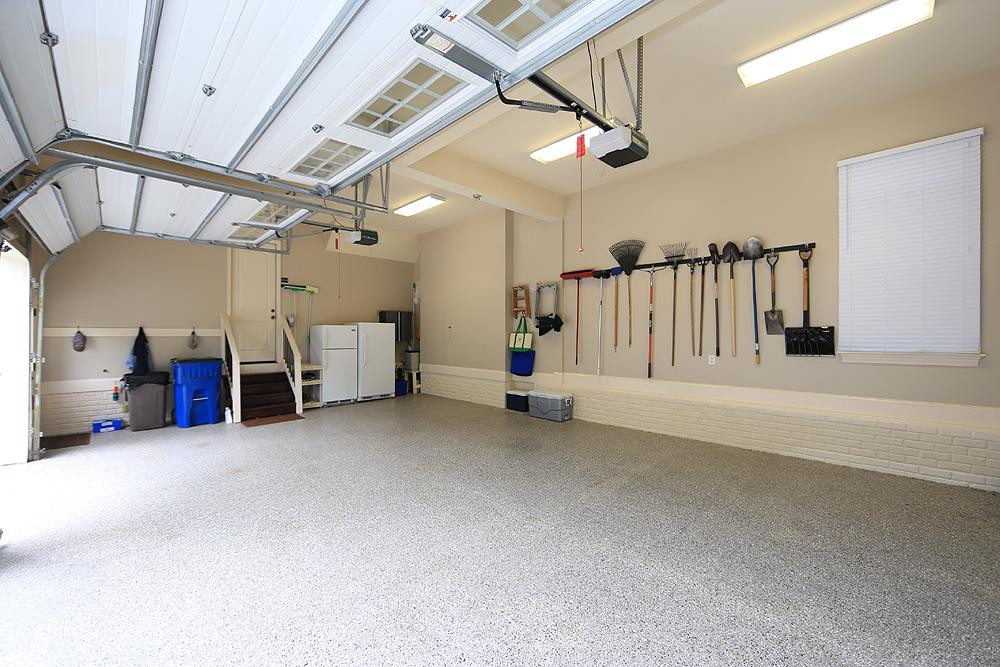1809 Silver Mist Court Raleigh, NC 27613 - Photo 29 of 30 Attached side load 3 car garage with epoxy floors and lots of storage. 3 car garage