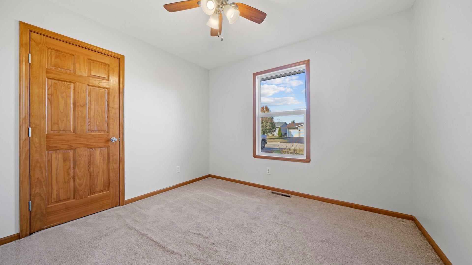 658 Cassandra Way South Beloit, IL 61080 - Photo 12 of 25 an empty room with a window