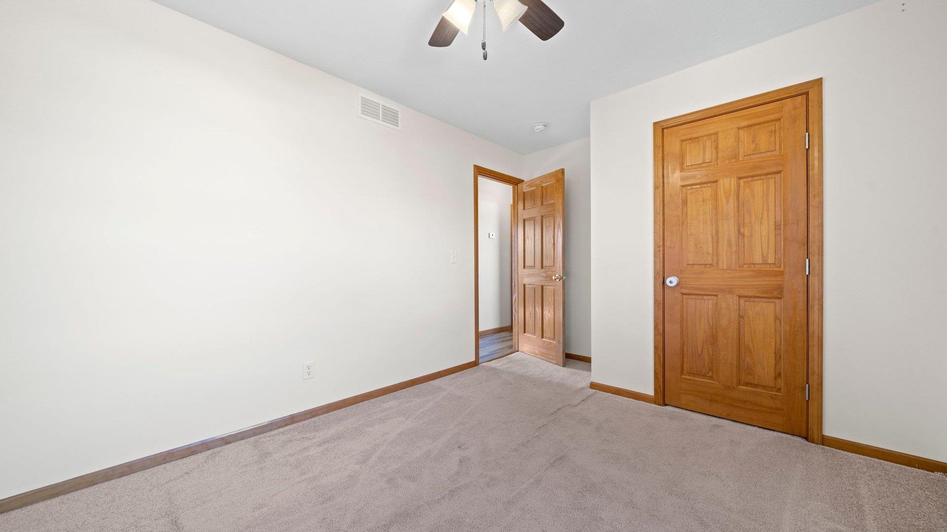 658 Cassandra Way South Beloit, IL 61080 - Photo 16 of 25 an empty room with chandelier fan