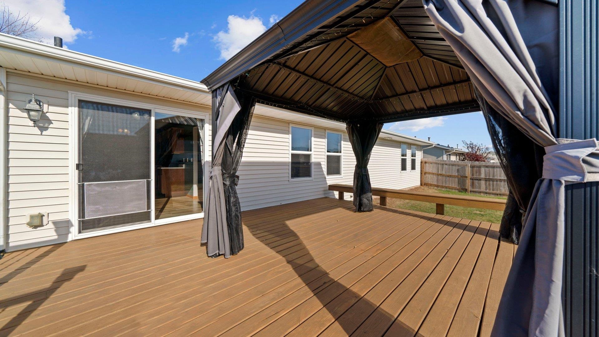 658 Cassandra Way South Beloit, IL 61080 - Photo 20 of 25 a view of outdoor space with wooden floor and barbeque oven