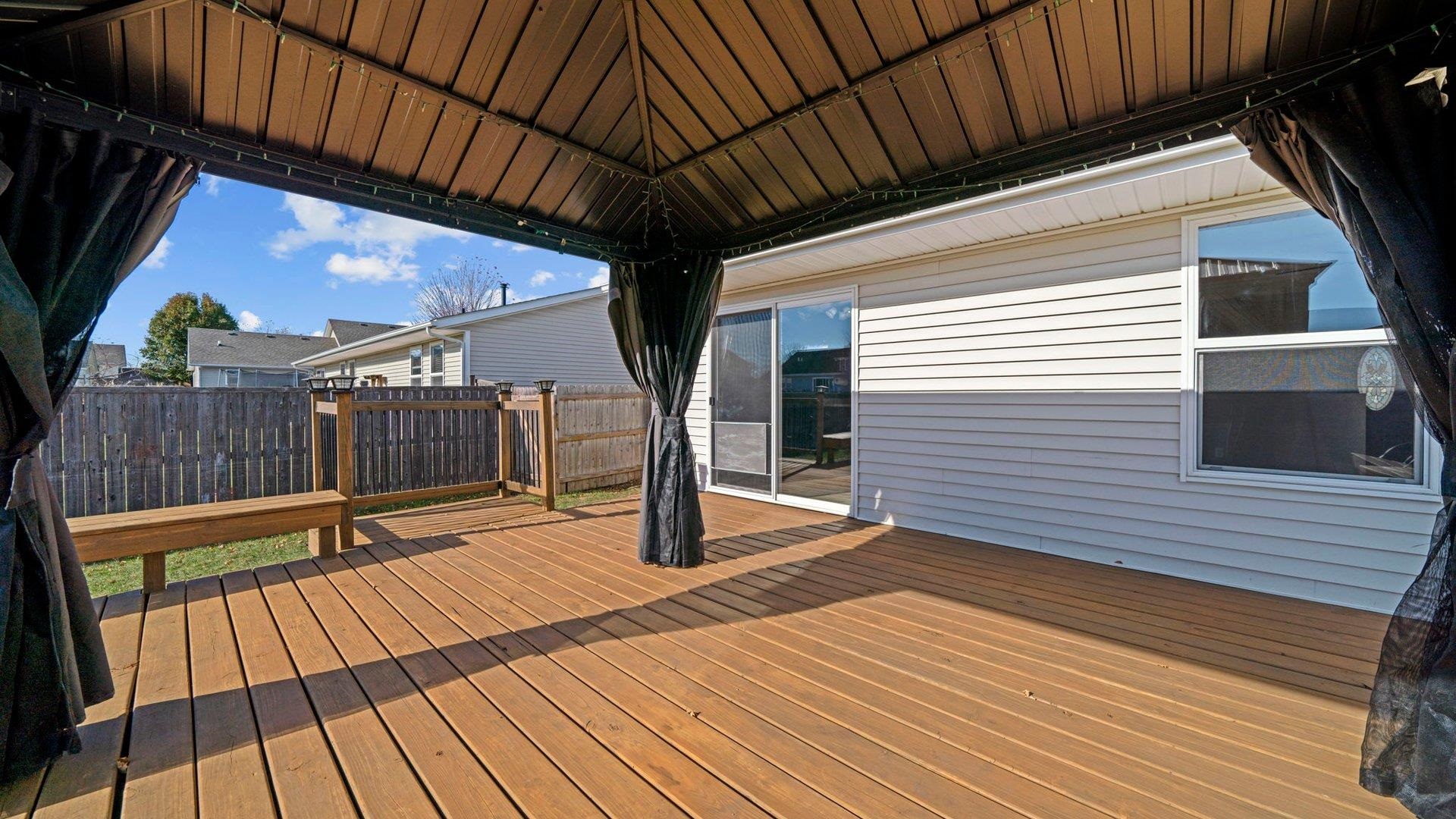 658 Cassandra Way South Beloit, IL 61080 - Photo 21 of 25 a view of outdoor space with wooden floor and iron stairs