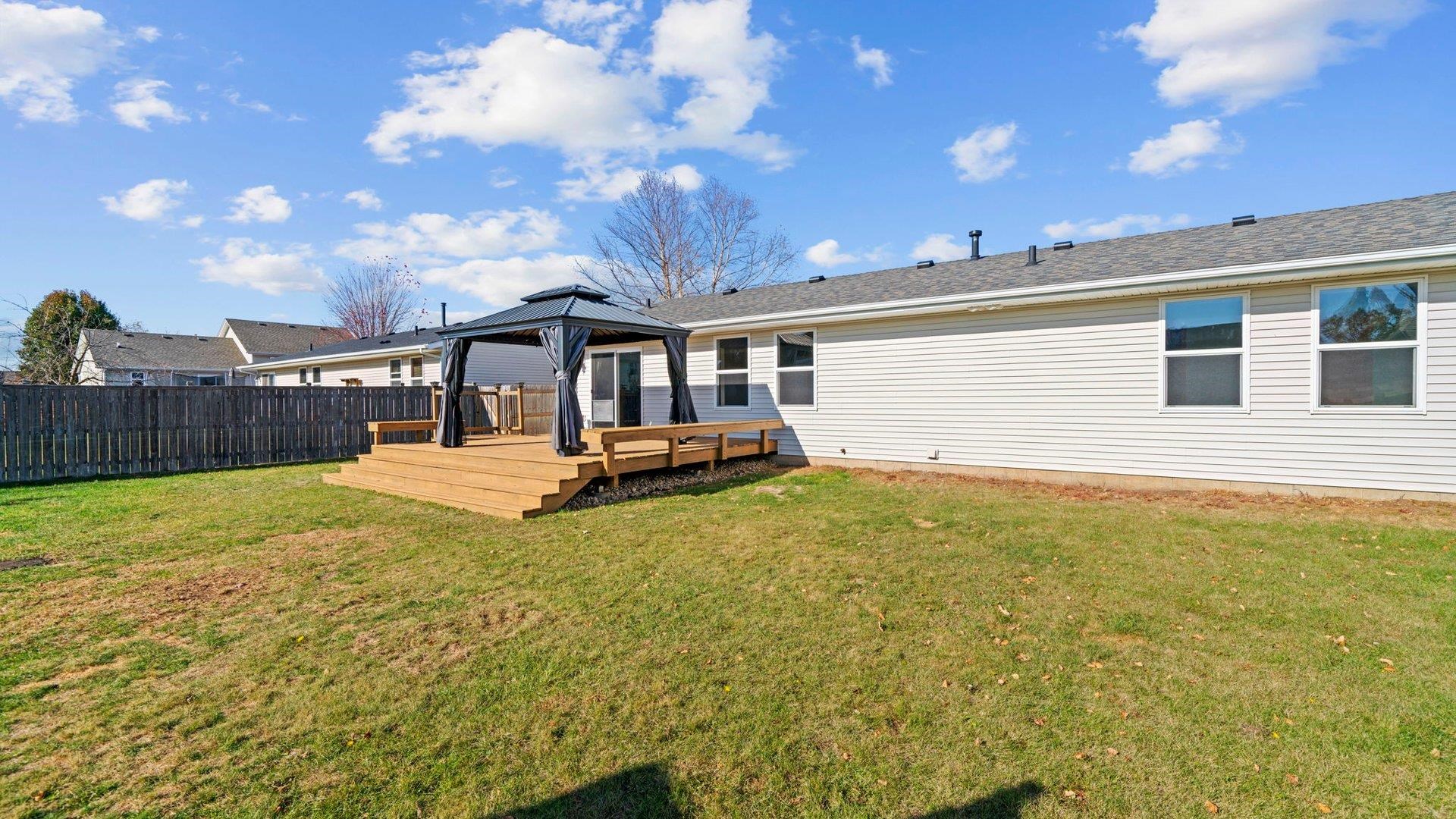 658 Cassandra Way South Beloit, IL 61080 - Photo 24 of 25 a view of a house with backyard and sitting area