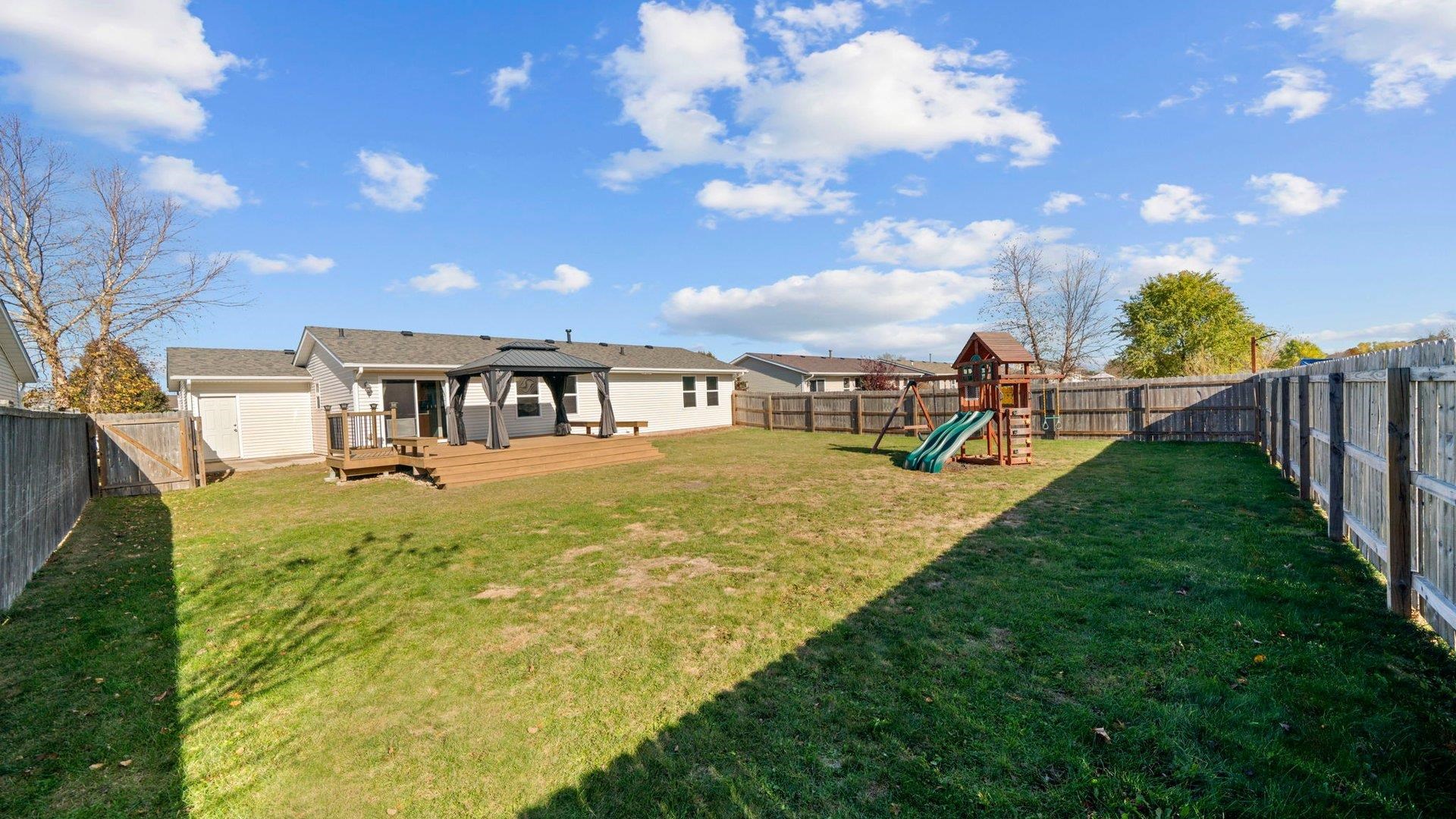 658 Cassandra Way South Beloit, IL 61080 - Photo 25 of 25 a view of a house with backyard and sitting area