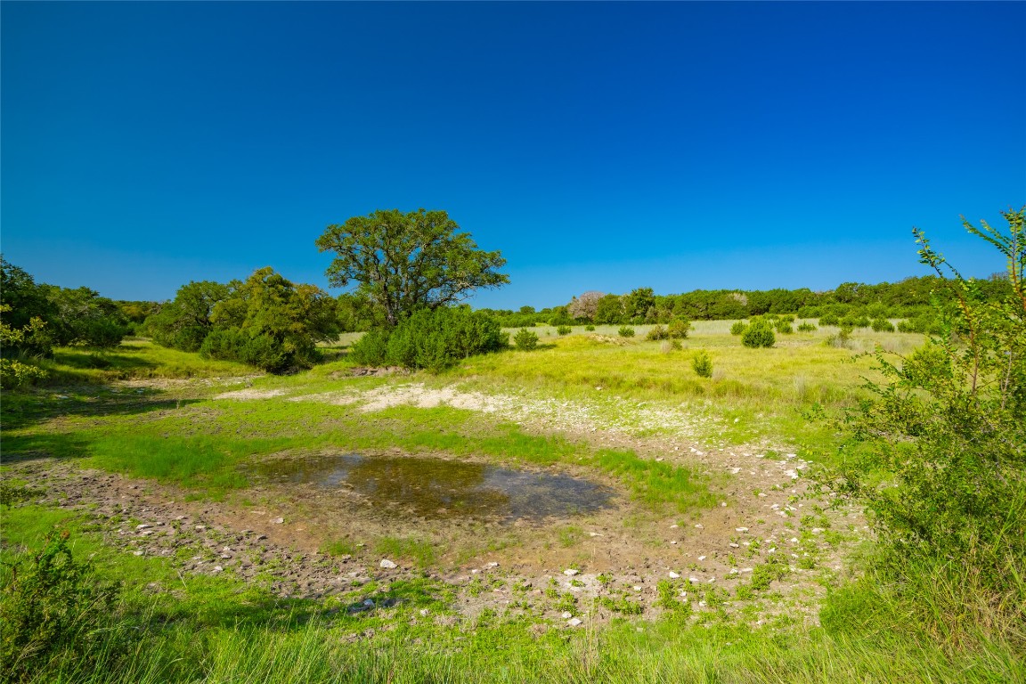 4 County Road 228 Florence, TX 76527 - Photo 15 of 18 a view of a yard with an ocean