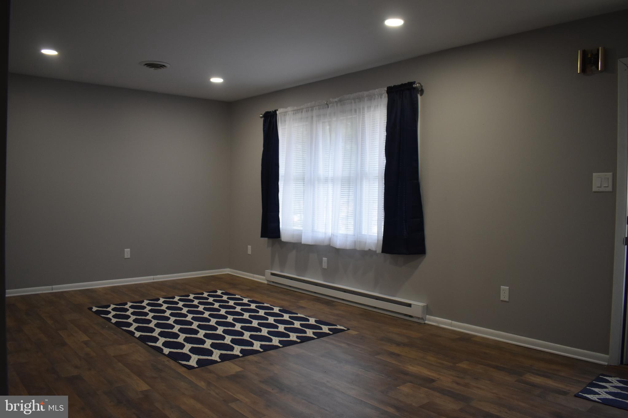26075 Fox Grape Road Greensboro, MD 21639 - Photo 10 of 35 Living room from the kitchen