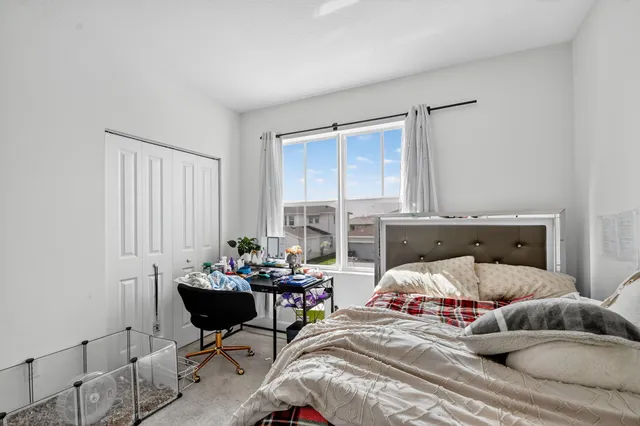 a view of swimming pool with outdoor seating and yard