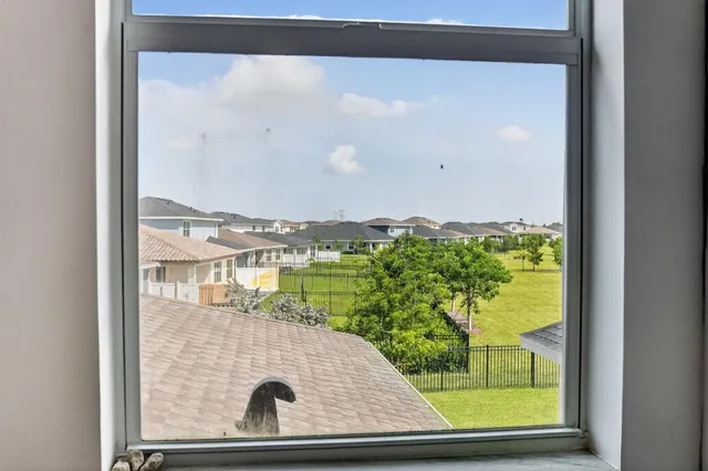a view of swimming pool with outdoor seating and plants