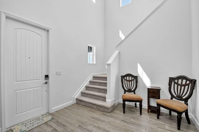 a kitchen with a sink appliances and cabinets