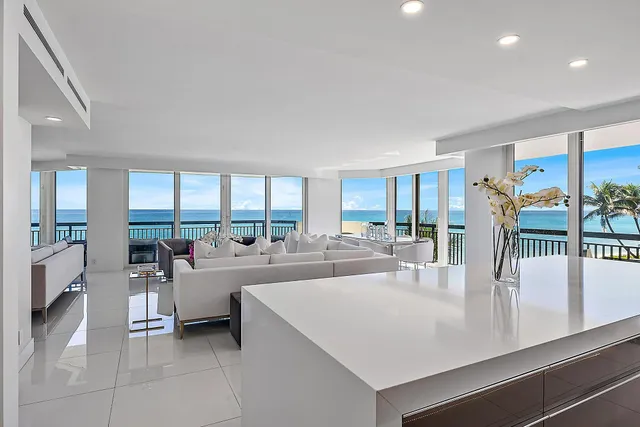 a view of a living room and dining room