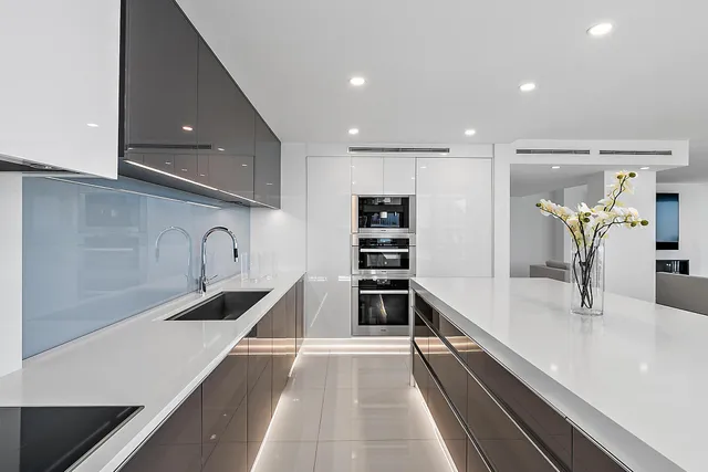 a hallway with cabinets