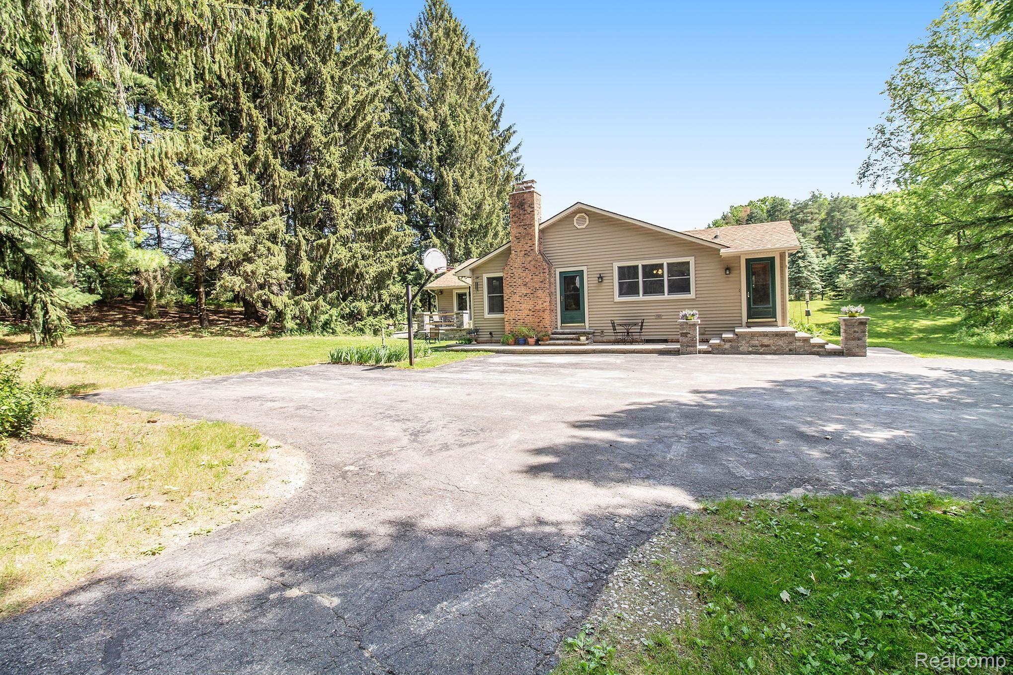 13171 Dunham Road Hartland, MI 48353 - Photo 45 of 61 View of house from pole barn