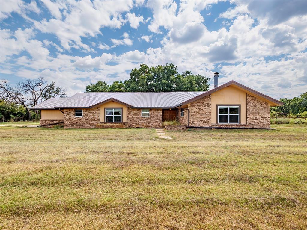 2415 Fm 2805 Talpa, TX 76882 - Photo 1 of 36 a house view with a garden space
