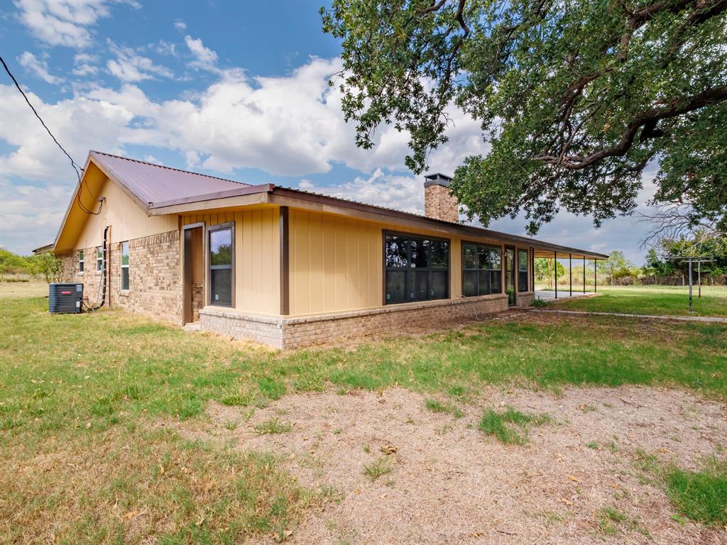 2415 Fm 2805 Talpa, TX 76882 - Photo 4 of 36 a view of a house with a backyard