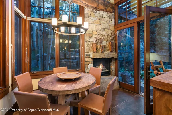 a outdoor space with a couch and a potted plant