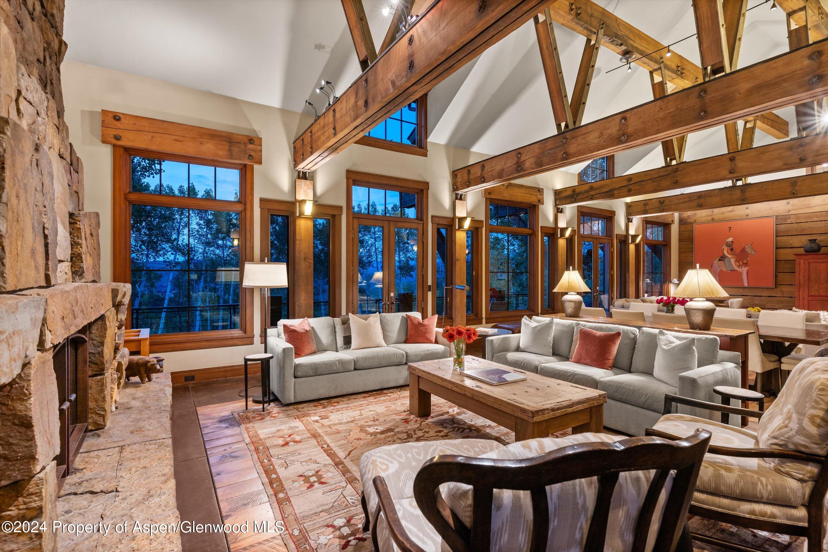 1021 Two Creeks Drive Snowmass Village, CO 81615 - Photo 2 of 47 a outdoor living space with patio furniture and a large window