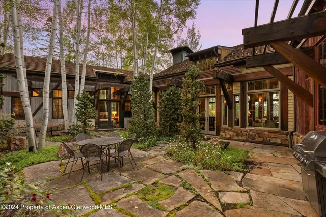 a view of a building with sitting area