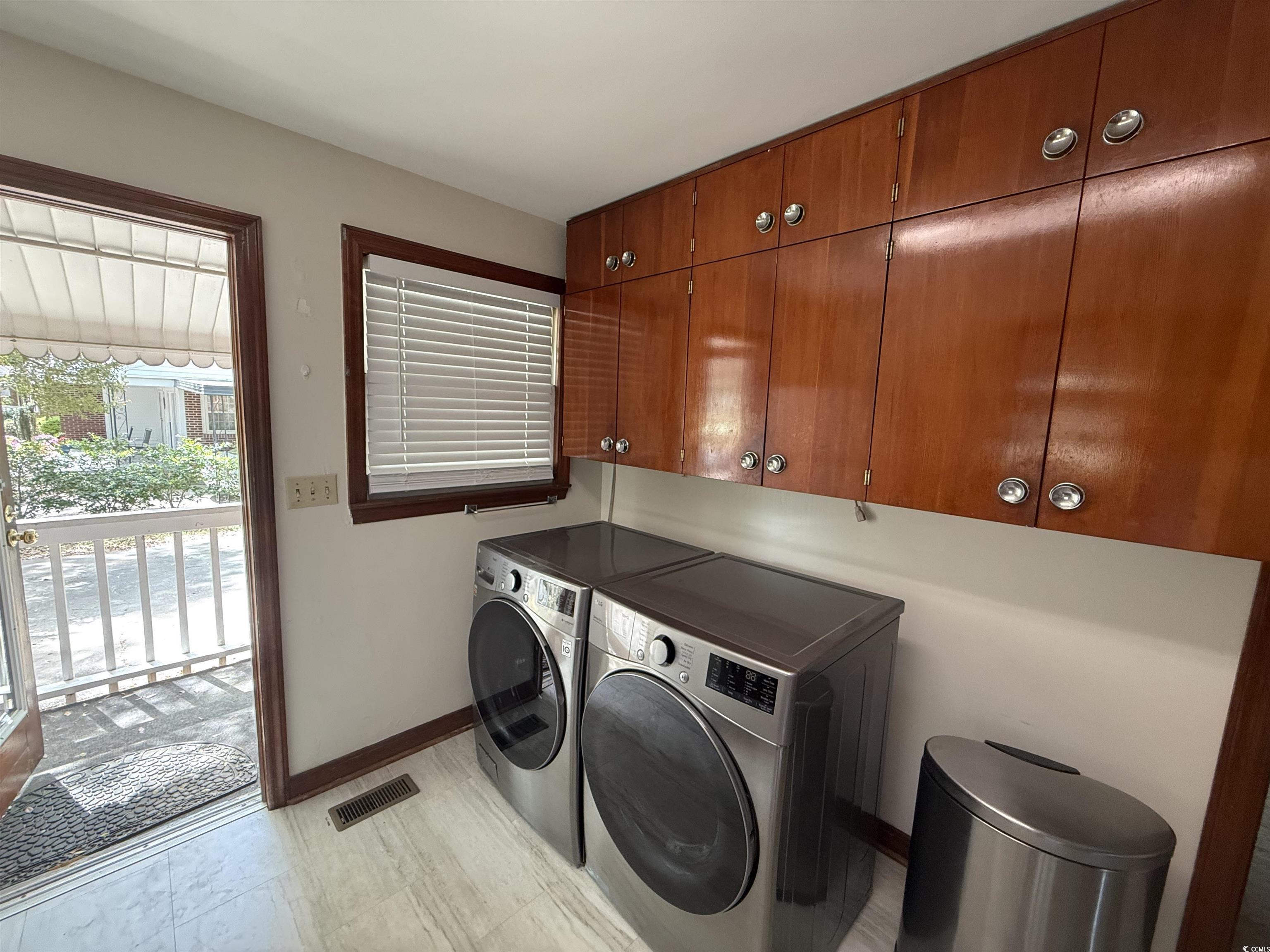 1208 Richmond Drive Georgetown, SC 29440 - Photo 3 of 9 Clothes washing area featuring cabinet space, base