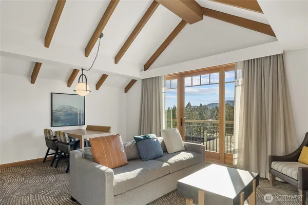 a view of a dining room with furniture