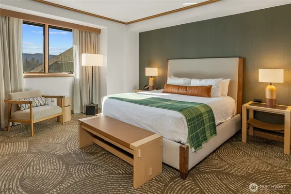 a bathroom with a tub and a sink