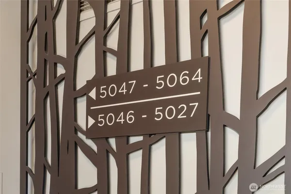 an aerial view of residential houses and outdoor space