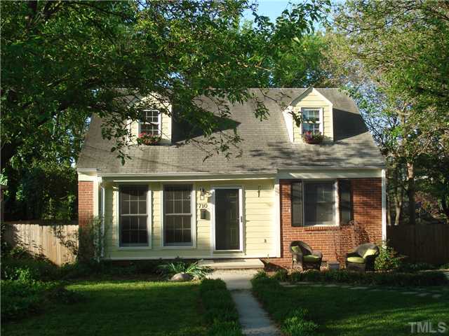 710 New Raleigh, NC 27608 - Photo 2 of 25 a front view of a house with a yard