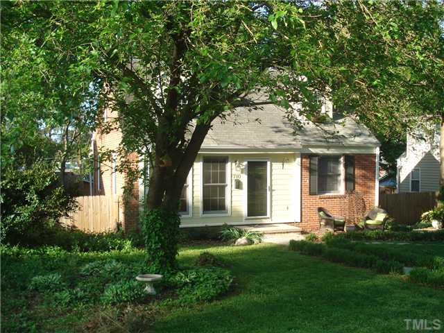 710 New Raleigh, NC 27608 - Photo 25 of 25 a front view of a house with garden