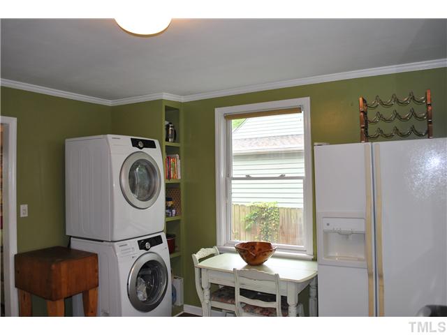 710 New Raleigh, NC 27608 - Photo 9 of 25 a utility room with dryer and washer