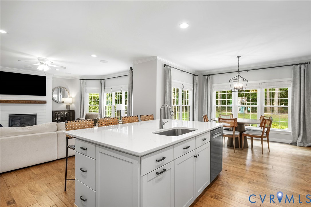 2319 Founders Bridge Road Midlothian, VA 23113 - Photo 13 of 50 Kitchen with light wood-style floors, crown moldin