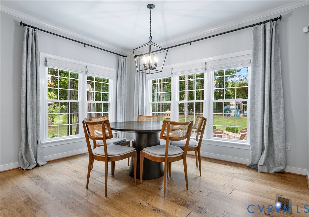 2319 Founders Bridge Road Midlothian, VA 23113 - Photo 17 of 50 Dining area featuring ornamental molding, hardwood