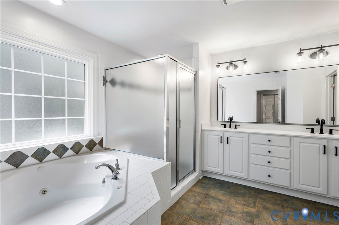 2319 Founders Bridge Road Midlothian, VA 23113 - Photo 31 of 50 Bathroom with a shower stall, a jetted tub, and do