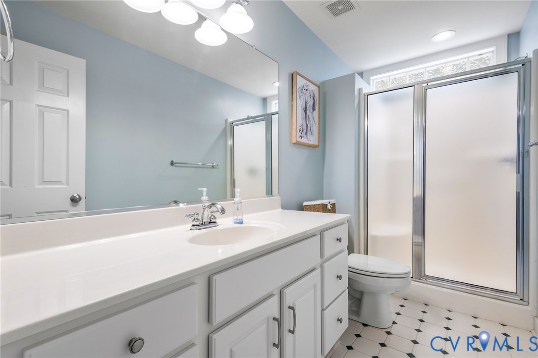 2319 Founders Bridge Road Midlothian, VA 23113 - Photo 36 of 50 Full bath featuring vanity, a shower stall, and ti