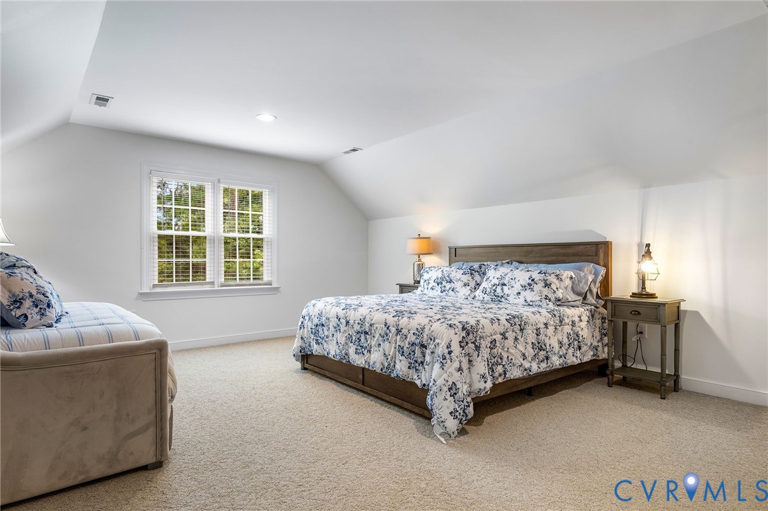 2319 Founders Bridge Road Midlothian, VA 23113 - Photo 40 of 50 Bedroom with carpet and vaulted ceiling
