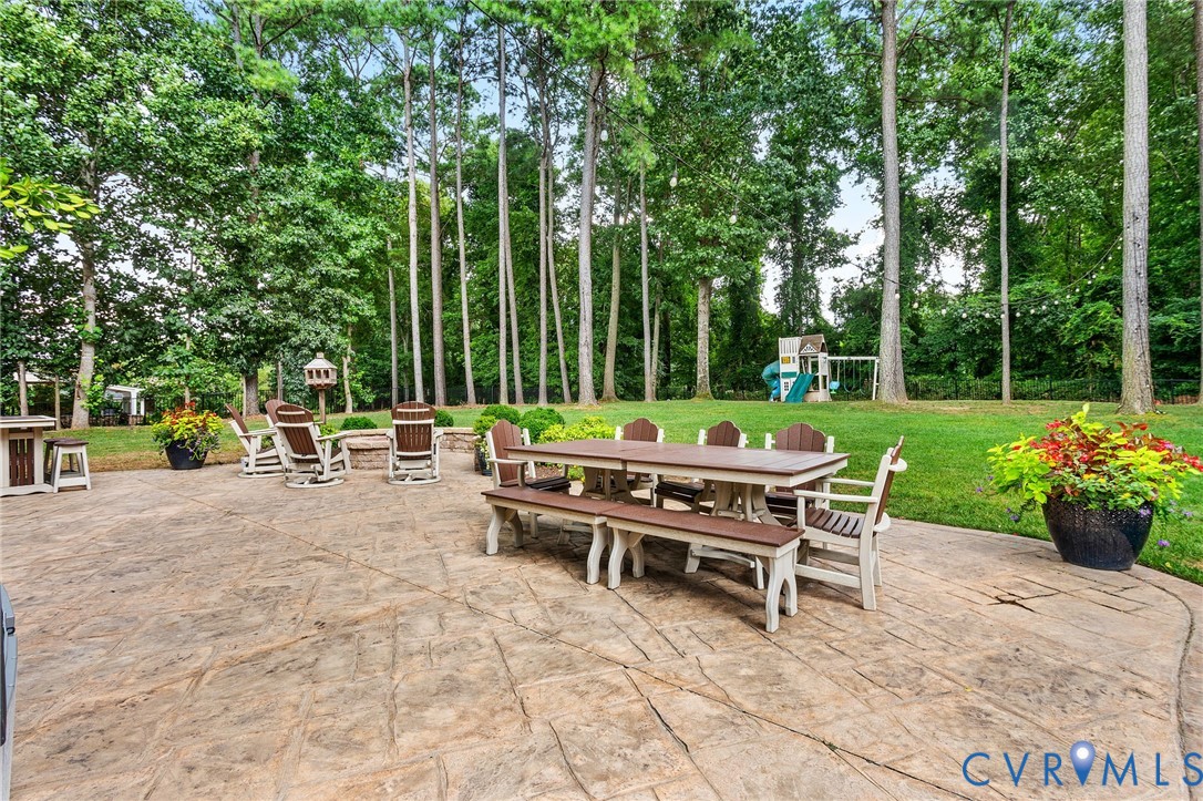 2319 Founders Bridge Road Midlothian, VA 23113 - Photo 44 of 50 View of patio with a playground and outdoor dining