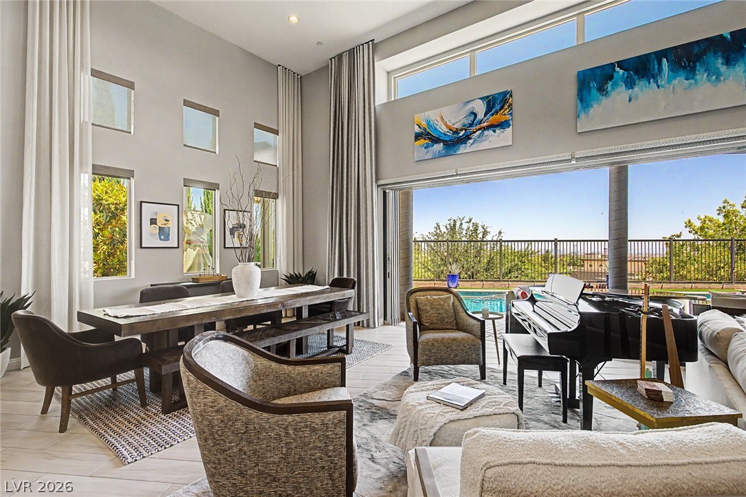 6014 Willow Ridge Court Las Vegas, NV 89135 - Photo 21 of 99 This expansive living area offers panoramic views and a seamless transition to outdoor entertaining.