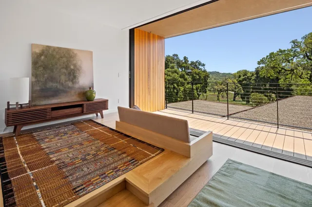 a view of a living room and window