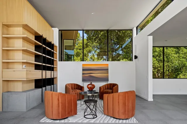 a view of livingroom with furniture and floor to ceiling window
