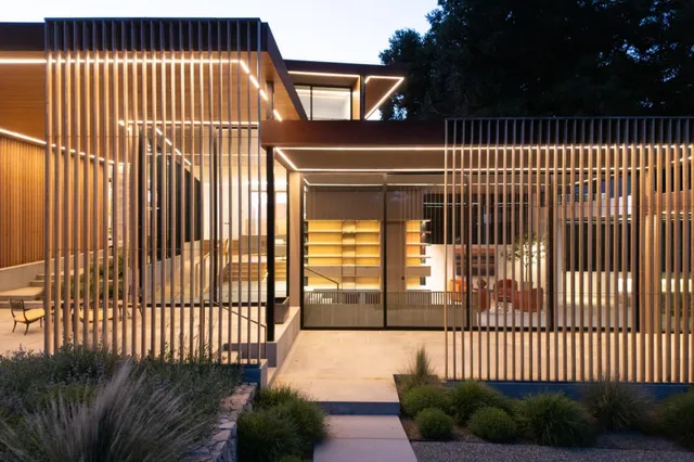 an aerial view of a house with a garden